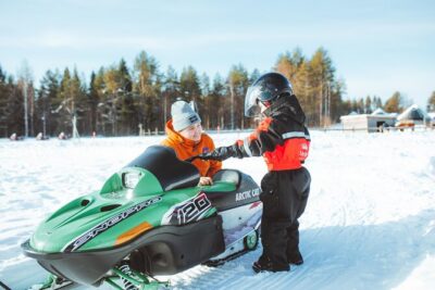 Family Snowmobiling in Rovaniemi, Apukka Resort - Entering the snowy forest: your guided arctic ride