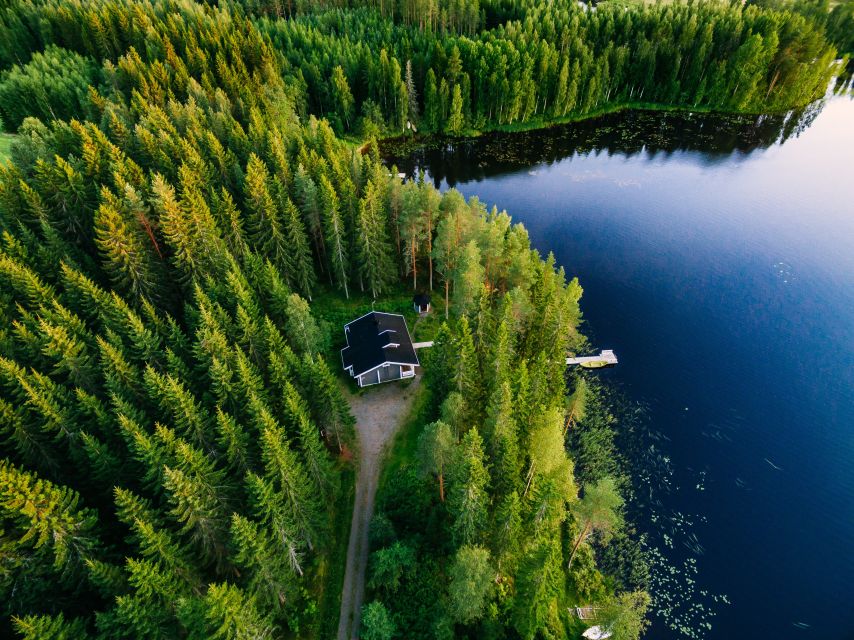 From Rovaniemi: Midnight Sun Forest Lake Float - Warm Drinks, Gingerbread, and a Proper Lapland Pause
