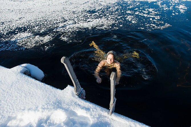 Lakeside Sauna Trip with Ice Fishing and Ice Swimming - Ice fishing: drilling the hole and learning the rhythm