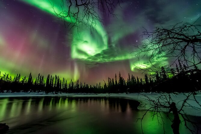 Northern Lights Hunt Including Snacks on Campfire from Rovaniemi - Hotel pickup and the drive away from town glow