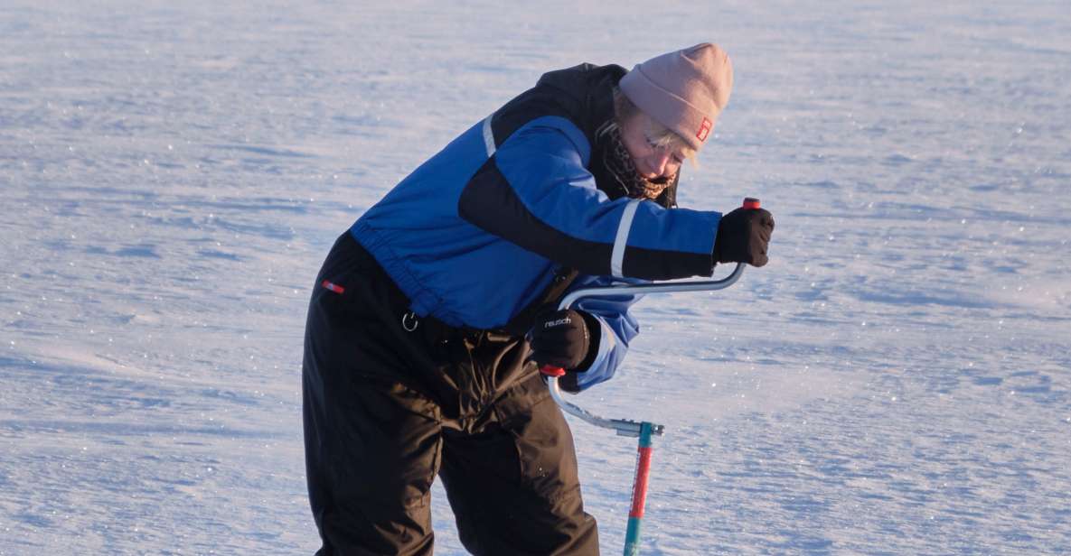 Rovaniemi: Ice-Fishing like a Finn - The fire wait: warm drinks, reindeer skin, and the real rhythm of fishing