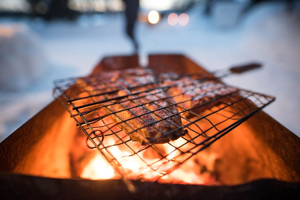 Rovaniemi: Lappish Evening Experience with Dinner - Dinner by the fire: blazed salmon comfort food in a cozy cottage