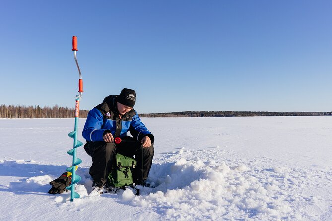 Snowmobiling and ice fishing in Apukka Resort, Rovaniemi - What About the Cold? Dress Like You Mean It