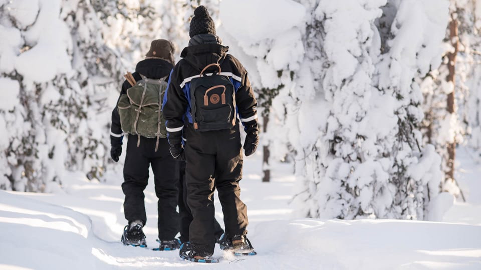 Snowshoeing in the Arctic Wilderness - Campfire picnic with reindeer burgers: the warmth and the stories
